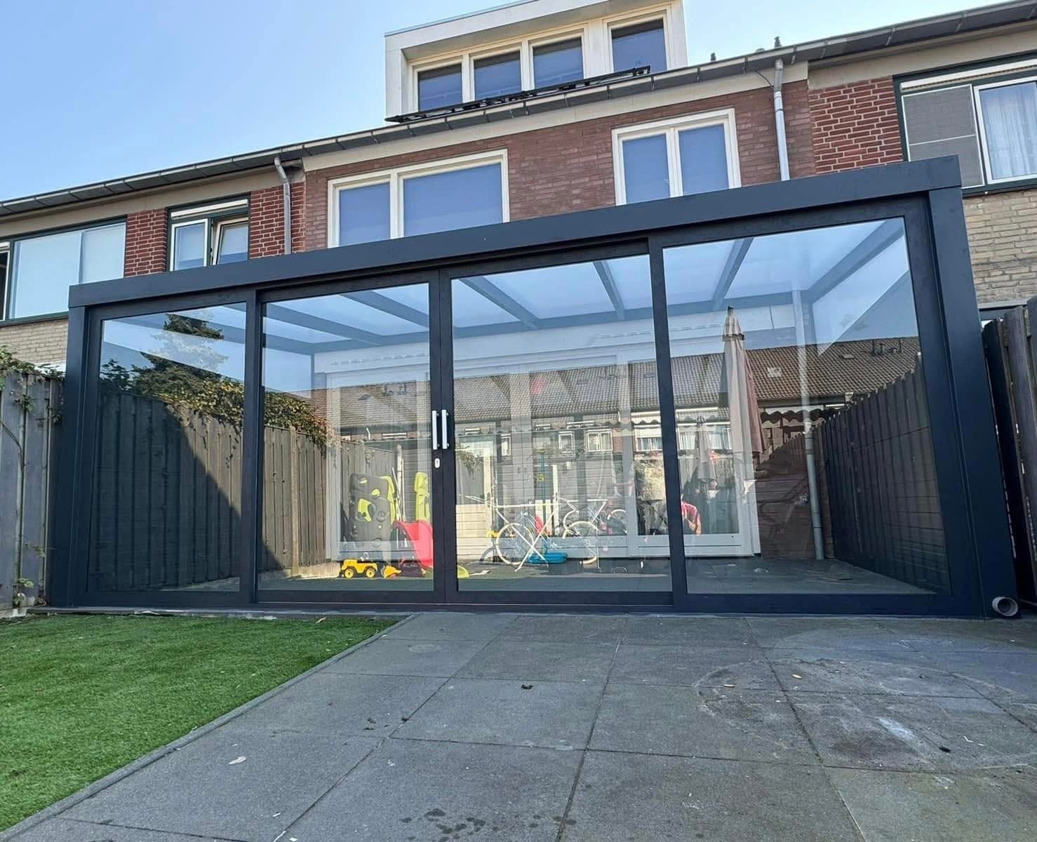 Veranda met schuifpui over de volle breedte